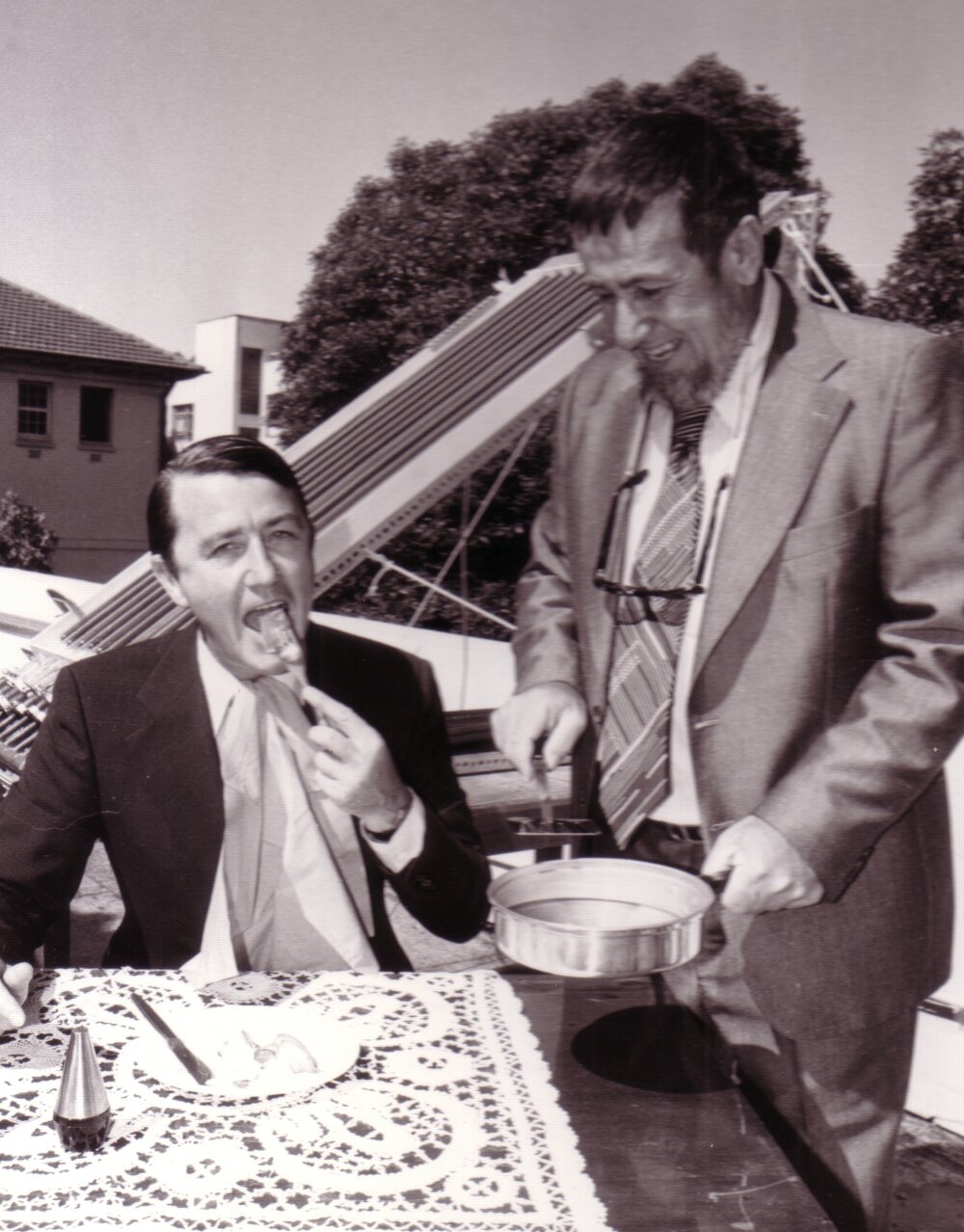 Professor Harry Messel Serves Bacon and Eggs Cooked in Solar-Heated Oil to Premier Neville Wran