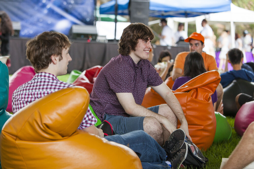 Students Relaxing on Bean Bag Chairs at Orientation Week