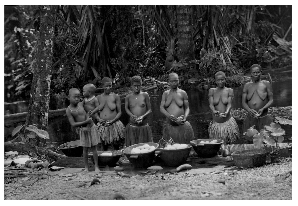Women Scraping Yams for Feast