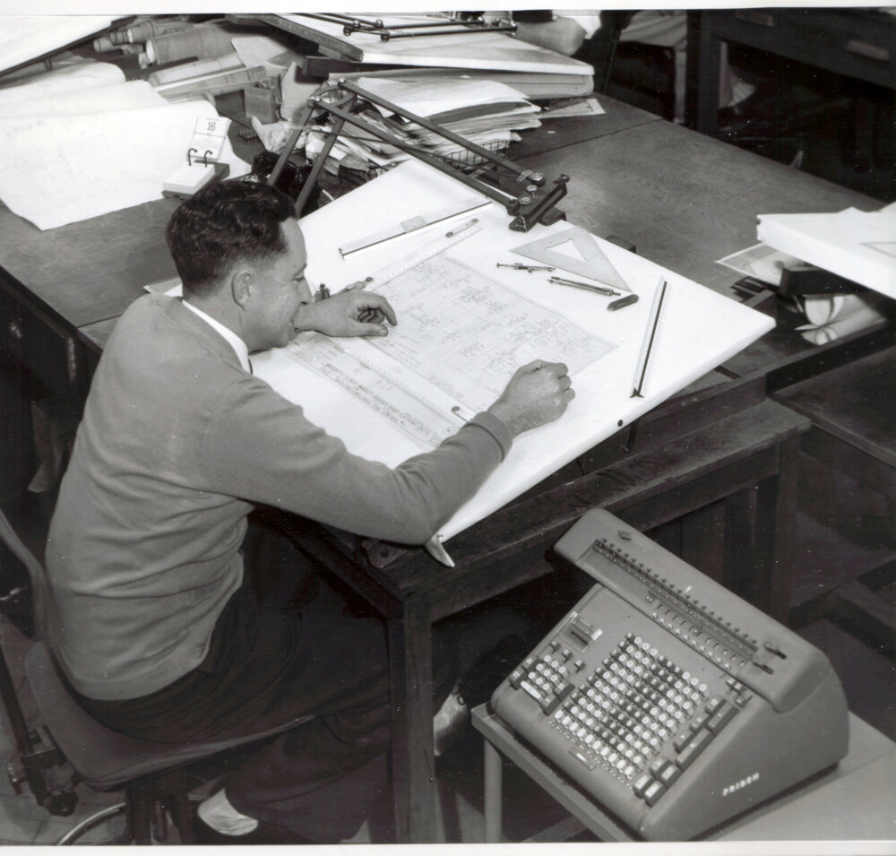 Engineer Interpreting a Circuit Diagram for Manufacture at STC