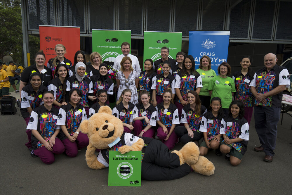 The Hon Craig Laundy and Bachelor of Oral Health Student Volunteers for the Carevan Sun Smiles Program