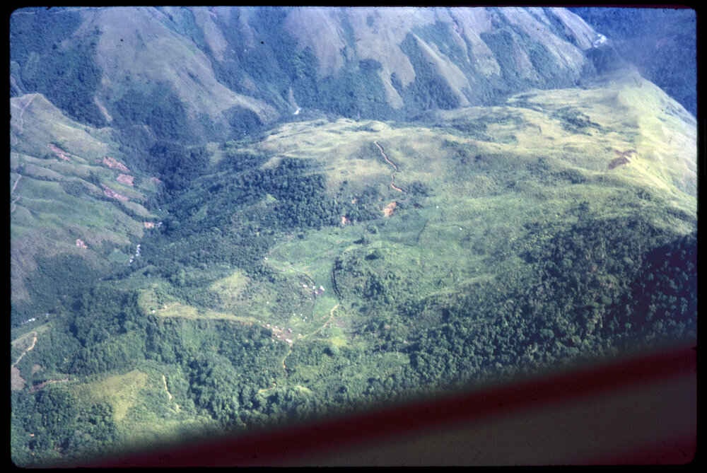 Aerial View of Mountainside and Villages
