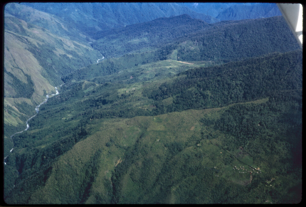 Aerial View of River and Village