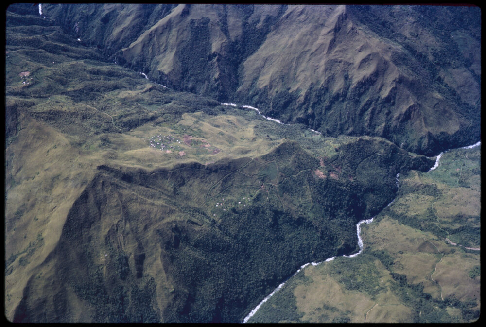 Aerial View of River and Village