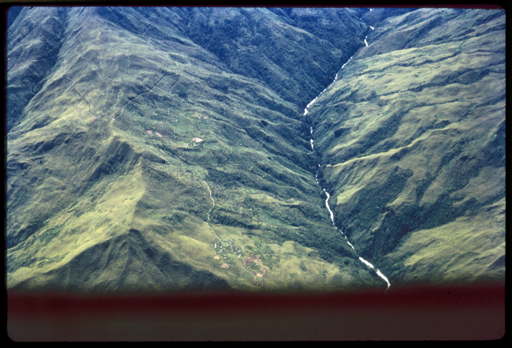 Aerial View of River and Village