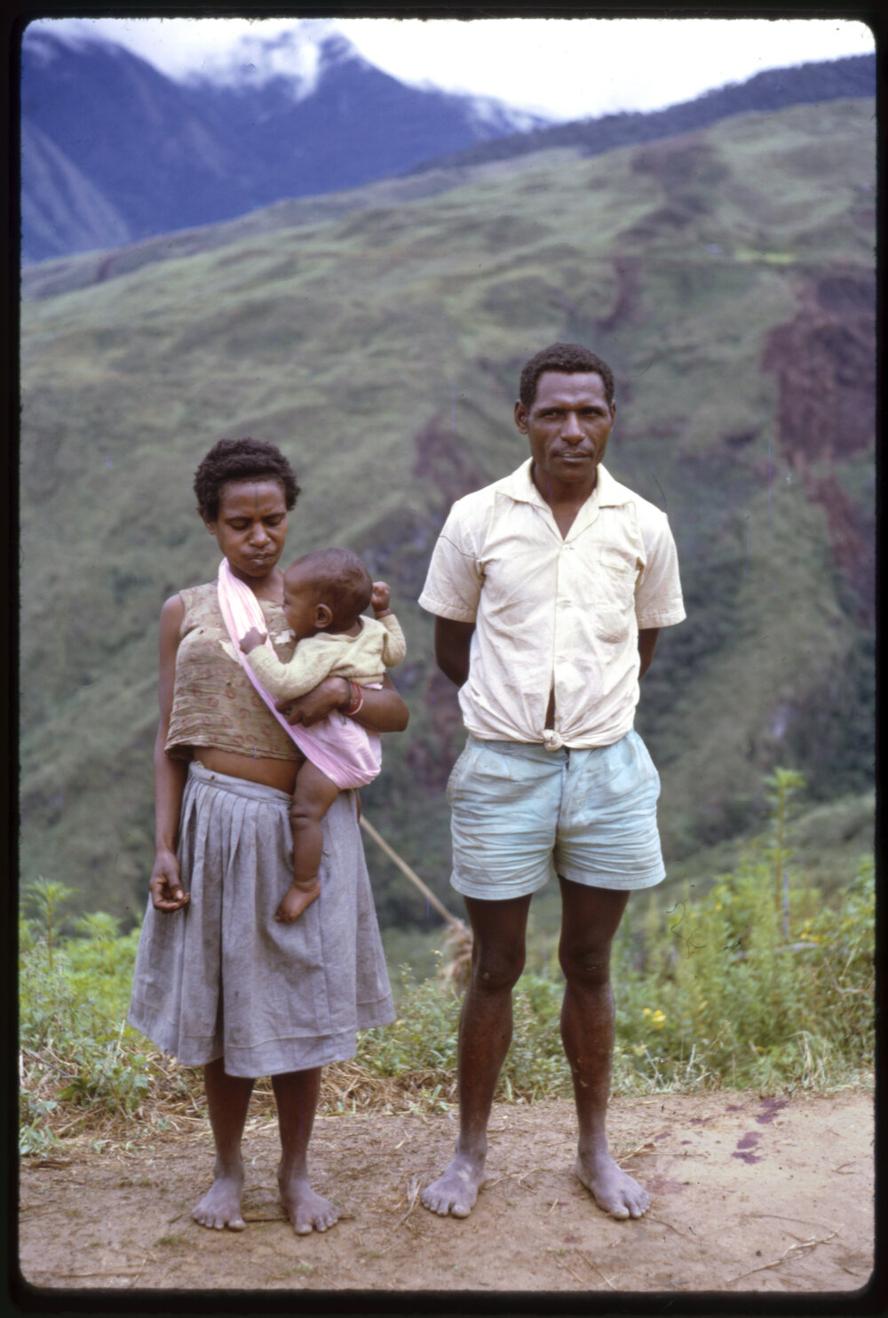 Man and Woman with Child