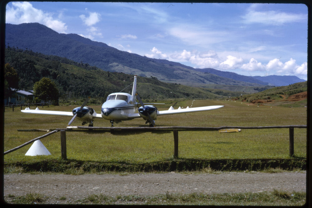 Plane on Landing Strip, Papua New Guinea