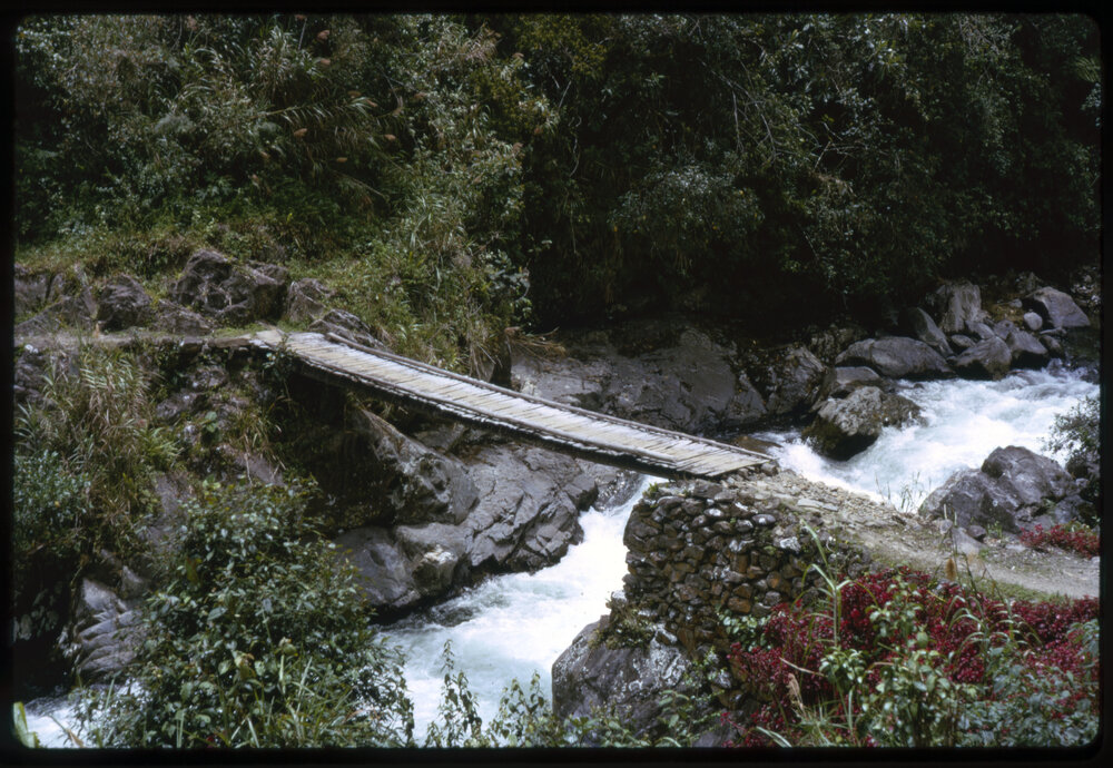 Wooden Bridge over River