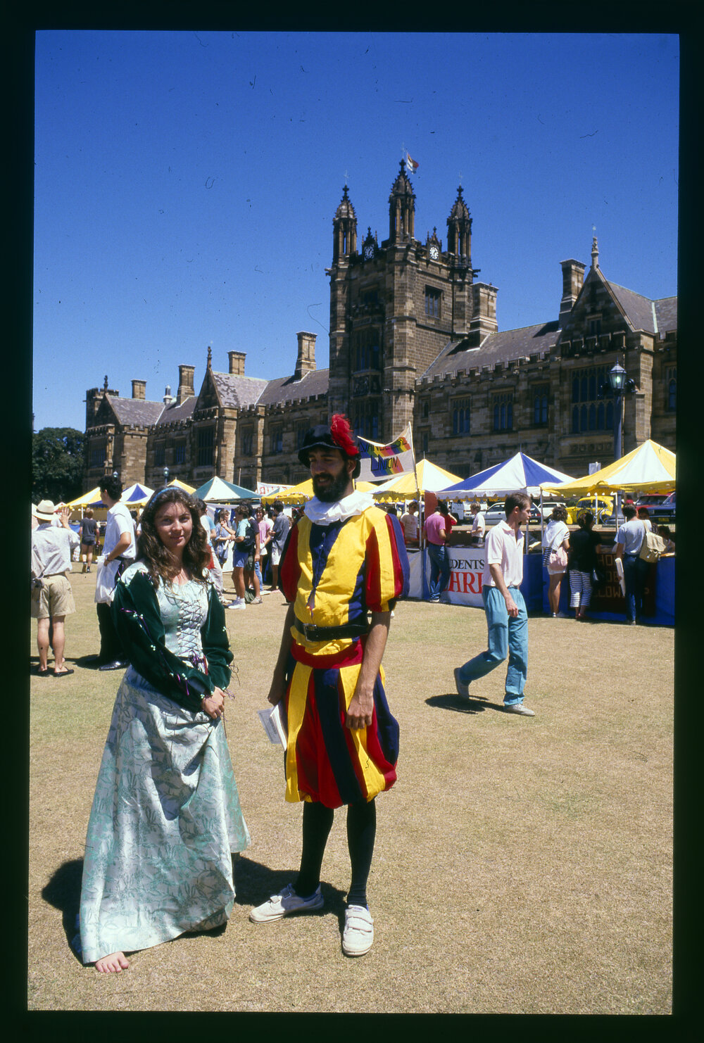 Two Students in Medieval Clothing on Front Lawn During Orientation Week 1987