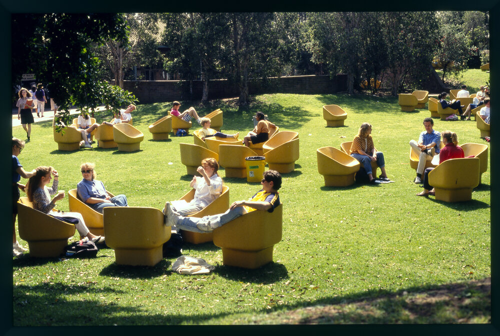 Students Sitting on Lawn at Cumberland Campus