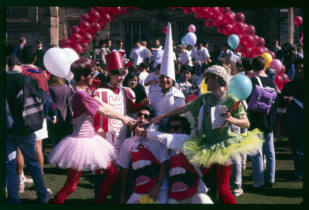 Dental Students Dressed as Tooth Fairies on Front Lawn
