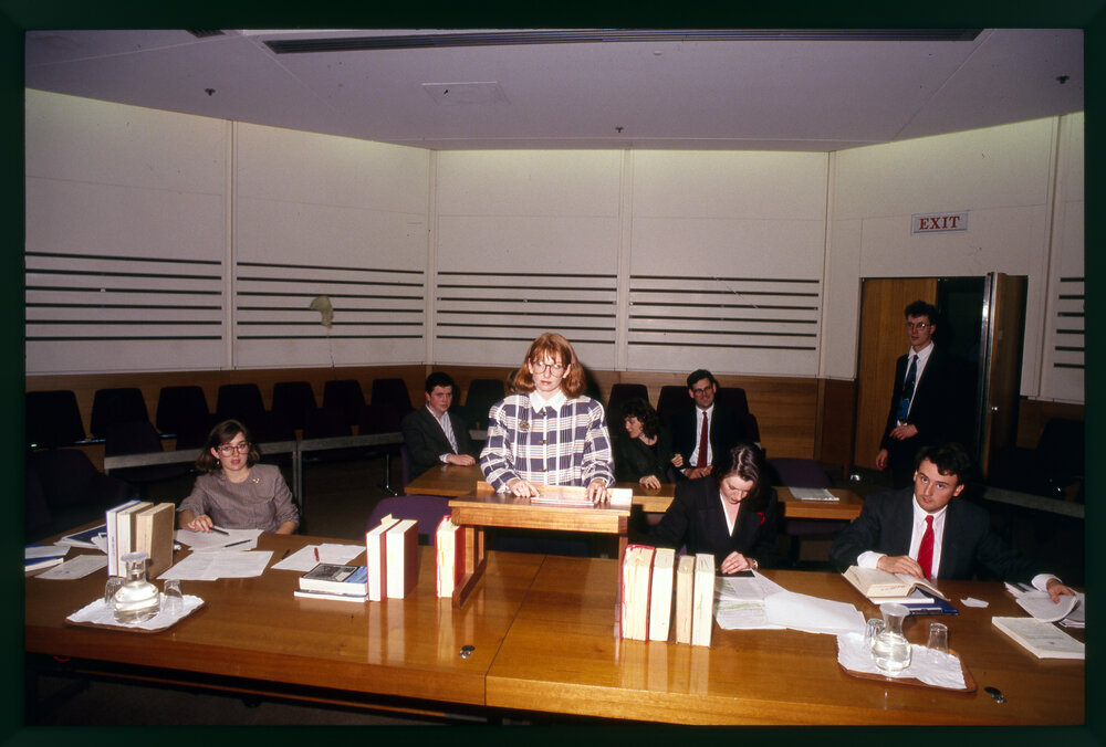 Law Students in Moot Court (?)