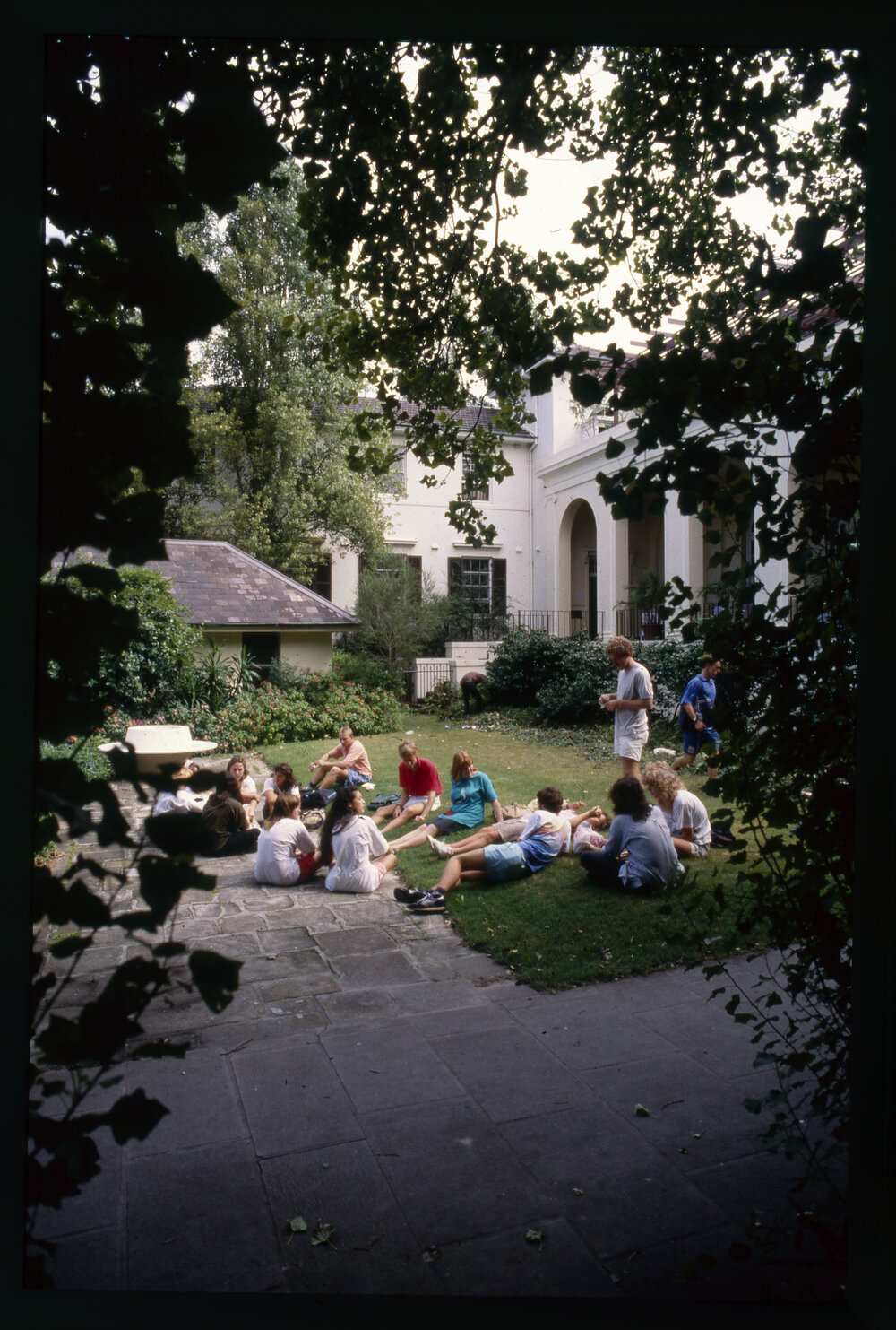 Students Sitting on Lawn at Holme Building