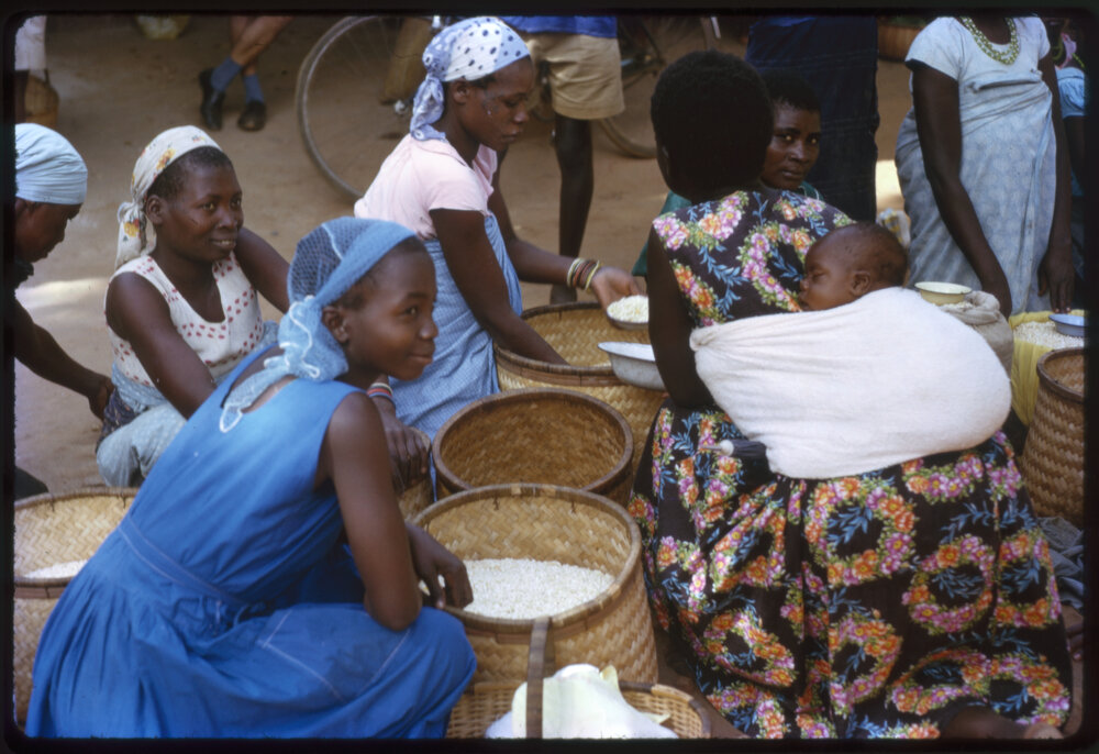 Women with Baskets of Grains