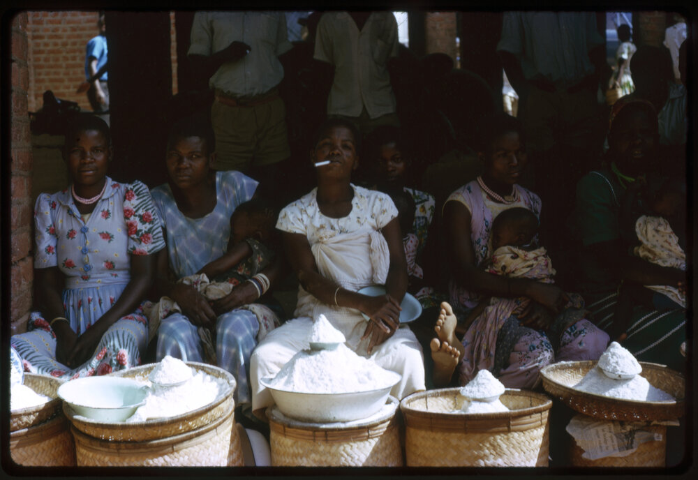 Women with Baskets of Grains
