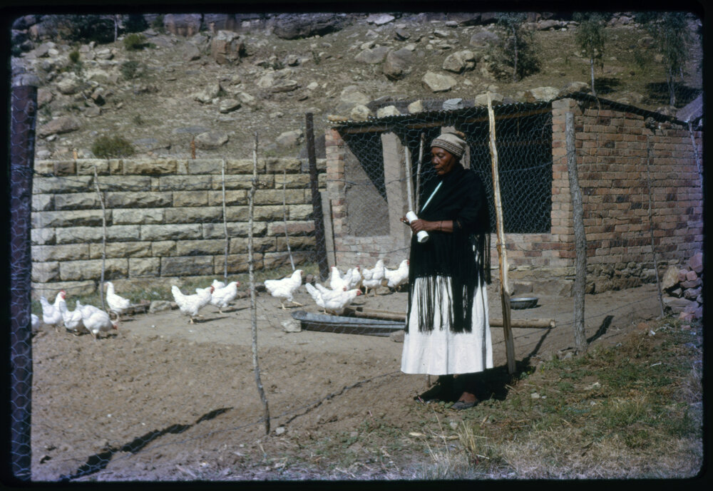 Woman Outside Chicken Coop
