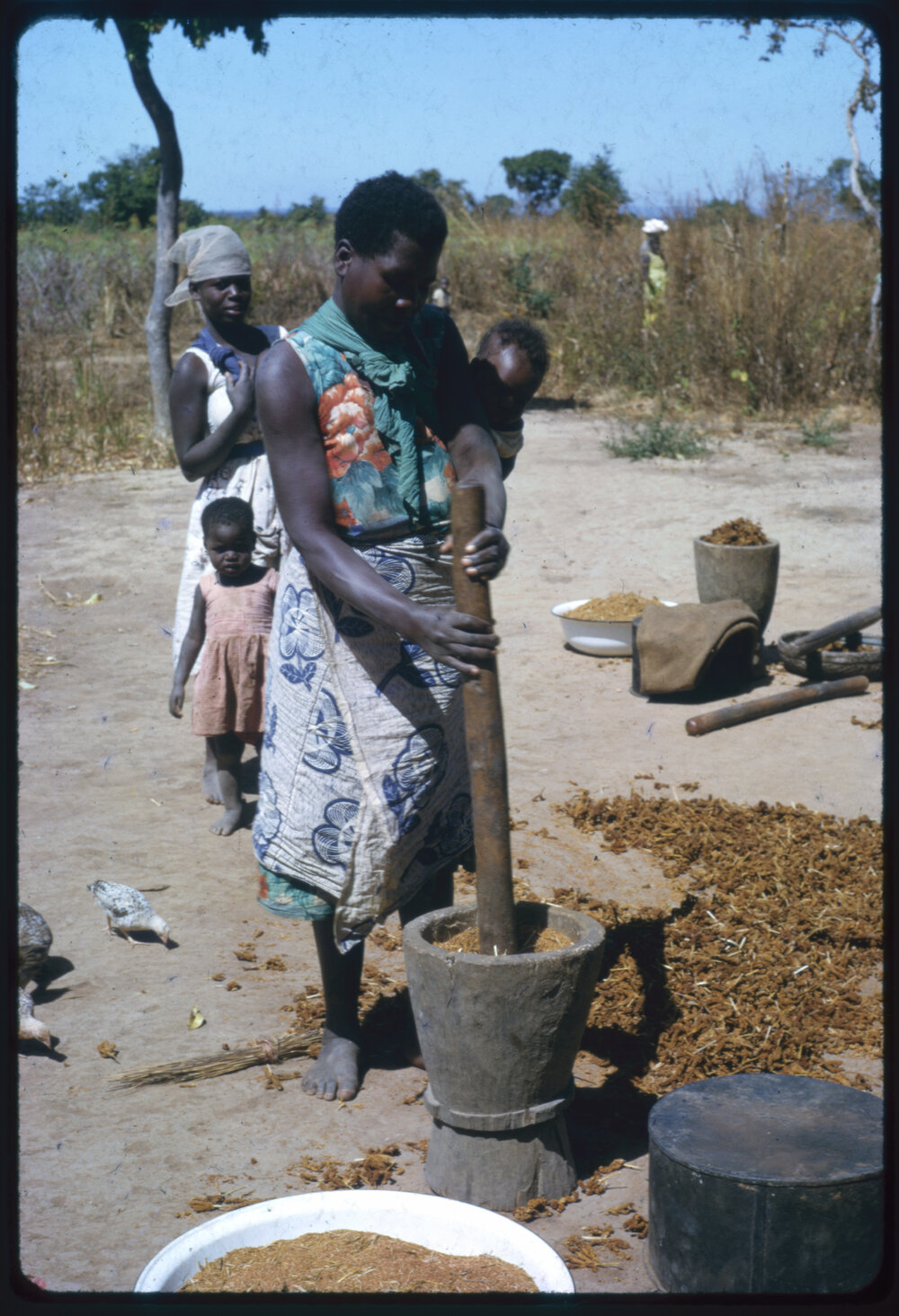 Woman Using Mortar and Pestle