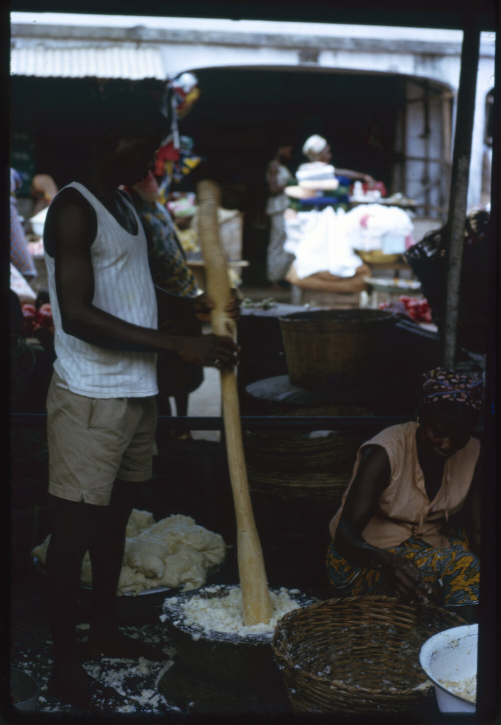 Man Using Mortar and Pestle