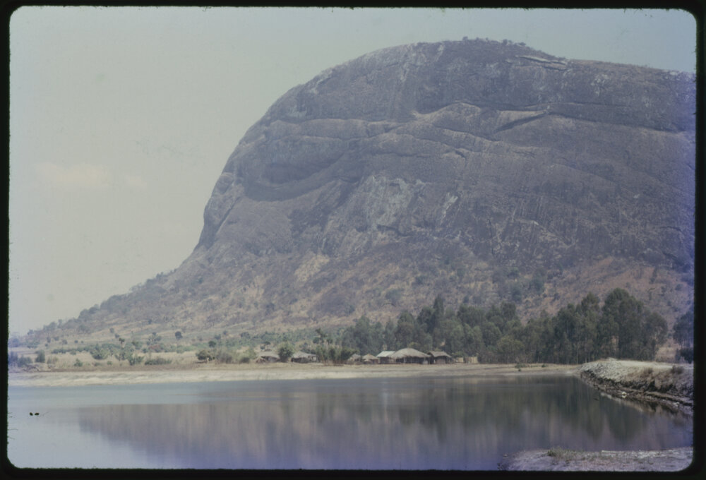 Small Village at Base of Cliff