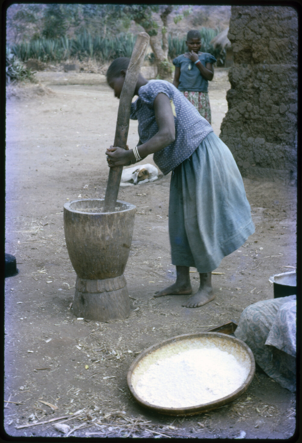 Woman Using Mortar and Pestle