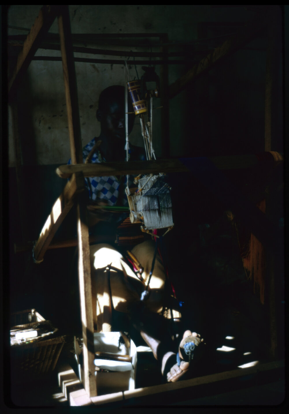 Woman Using Loom