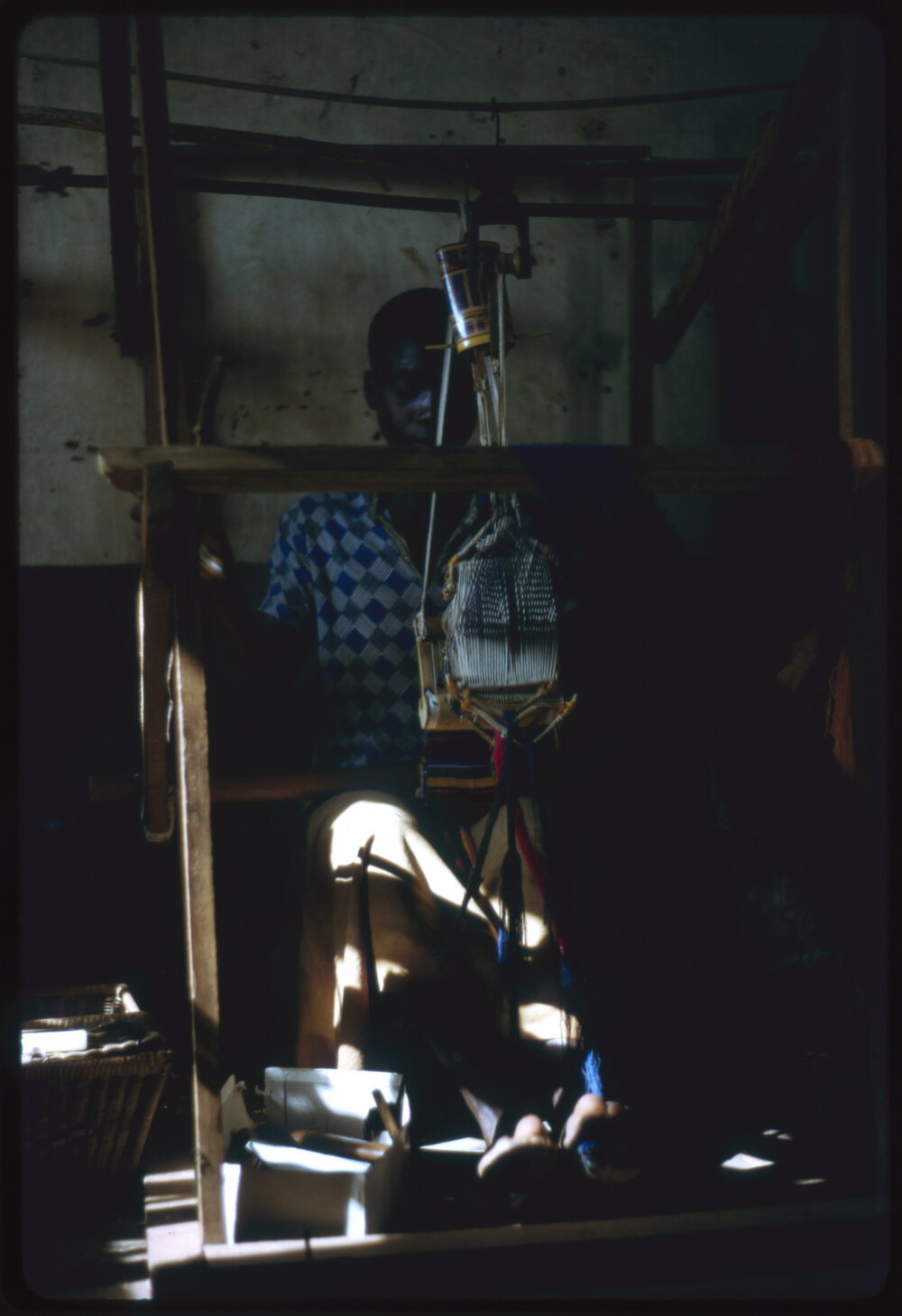 Woman Using Loom