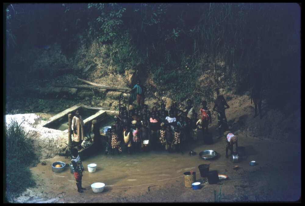 Group of People in Stream