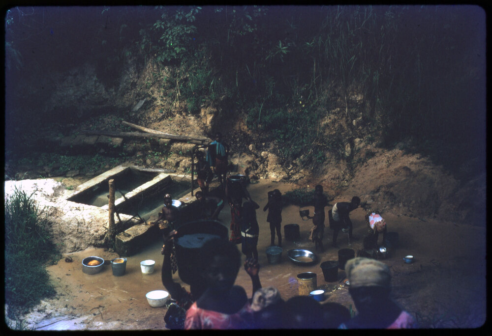 Group of People in Stream