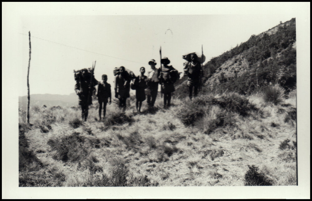 Porters at the Base of Mount Wilhelm