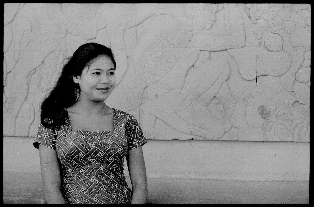Woman Standing in Front of Relief in Indonesia