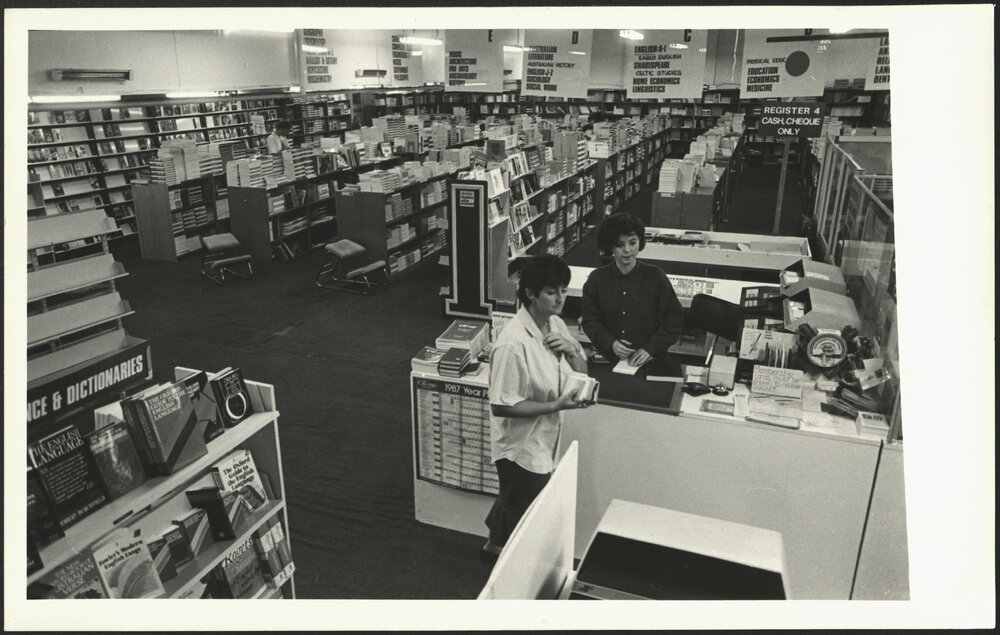 Interior of the Co-Op Bookshop with Two People at the Service Desk