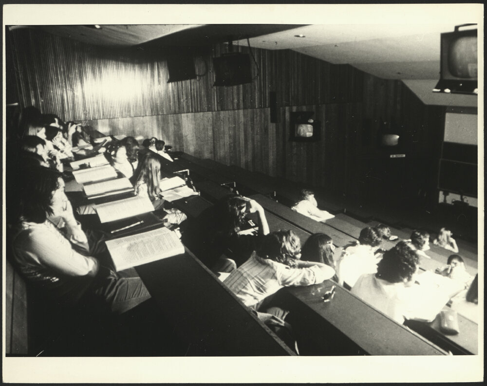 Students in a Lecture Room with Closed-Circuit Television Set Up in the Room