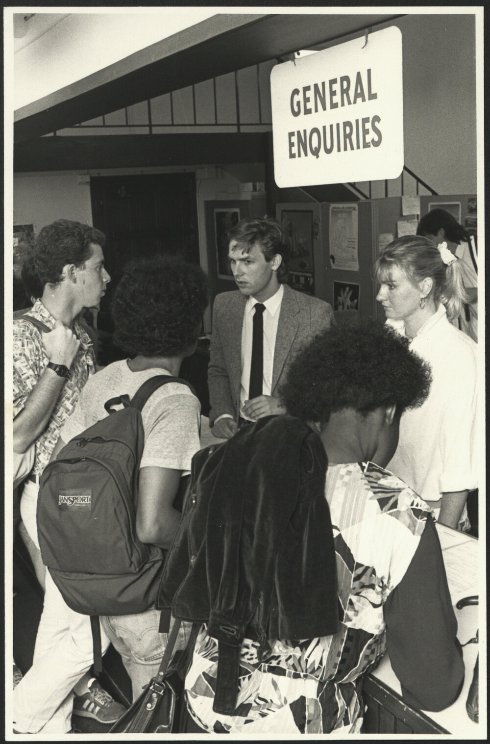 Students Making Enquiries at the Student Centre at the Northern End of the Main Quadrangle