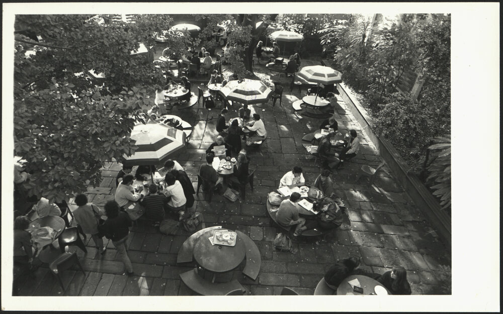 Staff and Students at Lunch Outdoors at Holme Building Garden, the 'Bevery' Courtyard