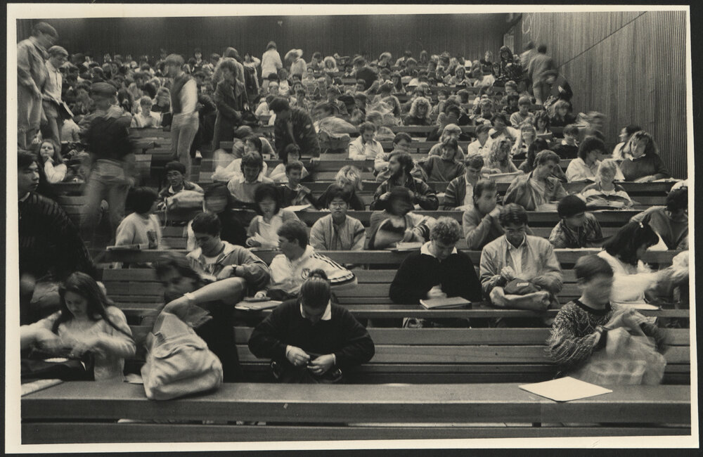 Students in a Lecture Room Preparing for Lecture