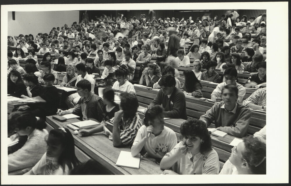 Students Sitting in Overcrowded Lecture Room