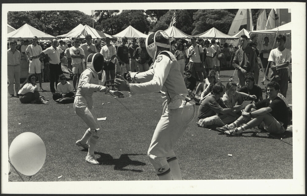 Orientation Week - Students Fencing on Front Lawn