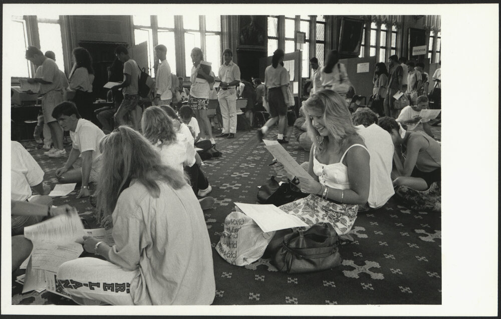 Students Sitting on Floor at Enrolment in MacLaurin Hall