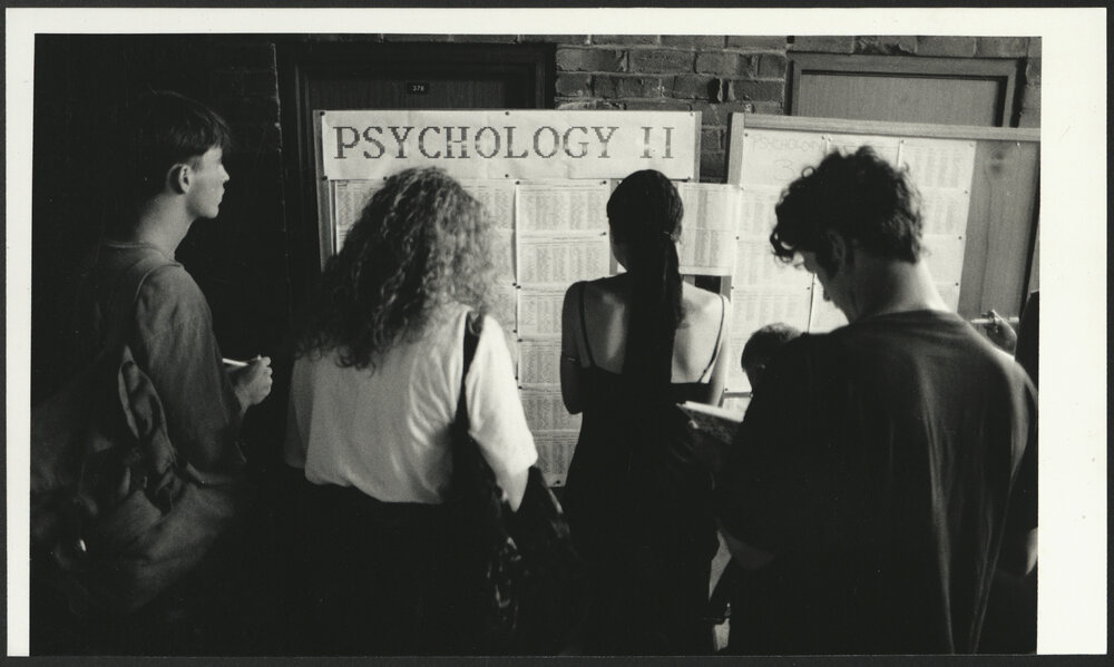 Student Checking Display Boards for Their Psychology 2 Examination Results