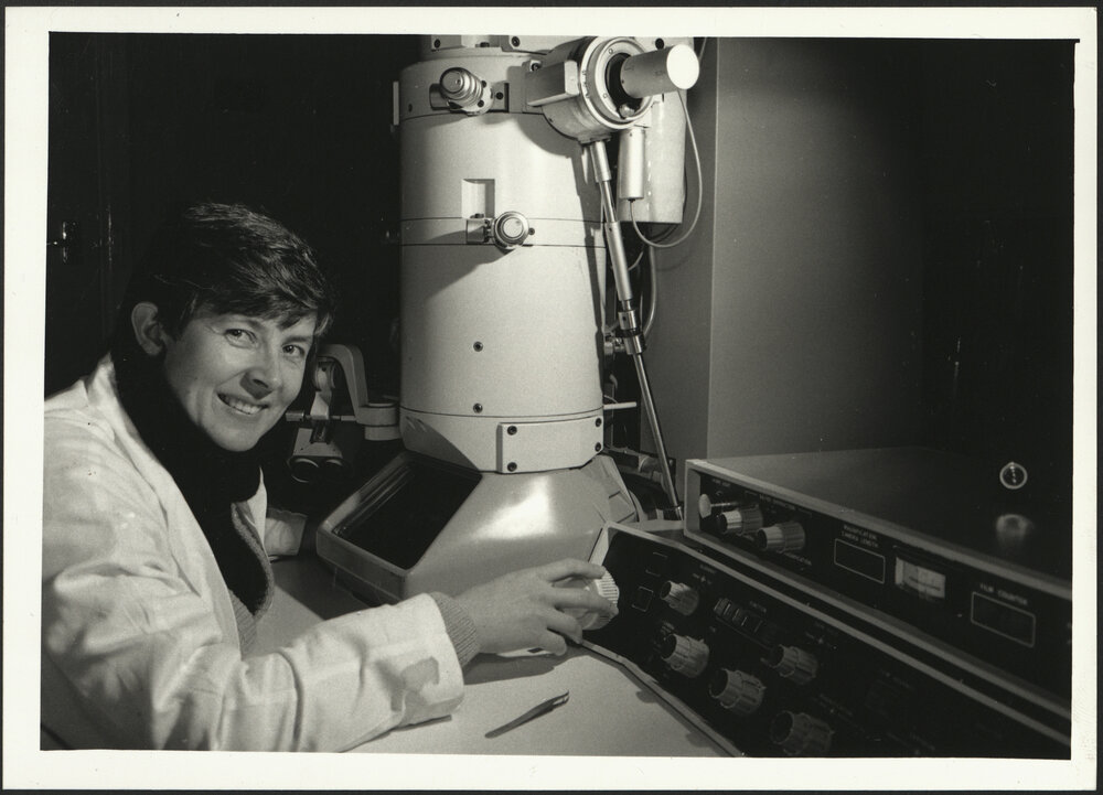 Biology - A Senior Student Examines Ultra-Thin Sections of Tissue Using the Electron Microscope