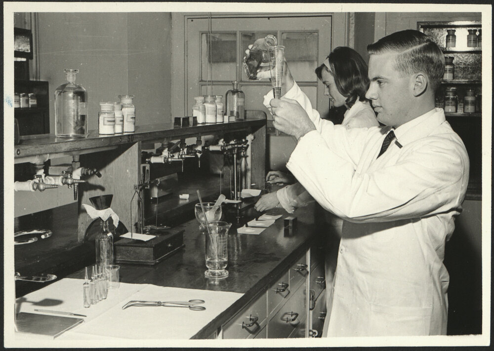 Pharmaceutical Chemistry Laboratory Two Students Preparing Medicines