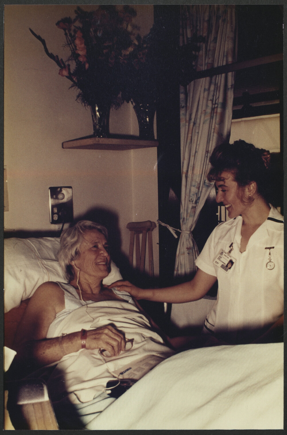 Faculty of Nursing - Putting Theory into Practice Nursing Student on the Ward at the Bed of a Hospital Patient
