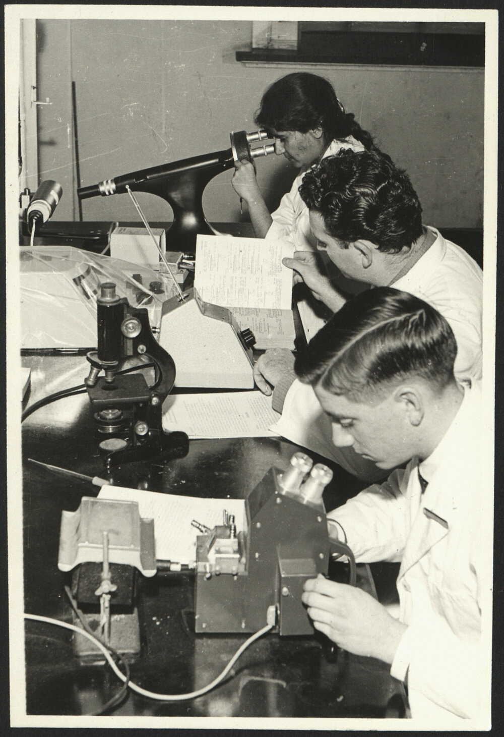 Pharmacy Laboratory - Students Using Microscopes