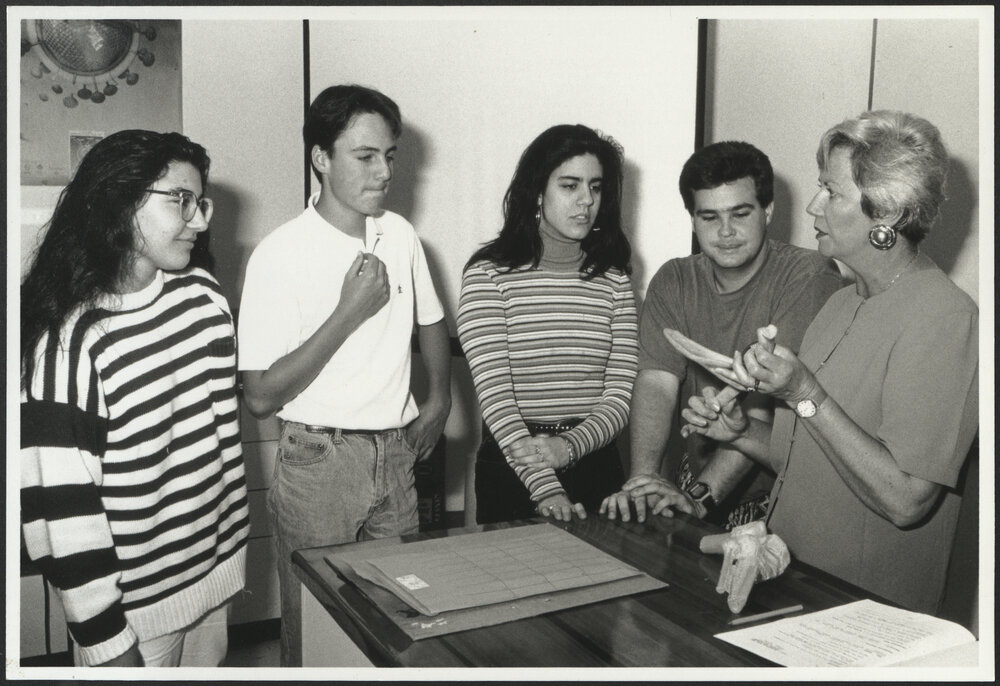 Faculty of Nursing - Students Listening to a Lecturer Learning About the Life Sciences