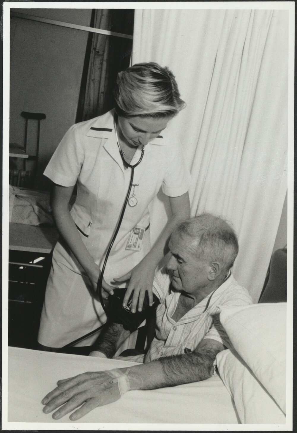 Faculty of Nursing - Clinical Placement Student About to Take Blood Pressure
