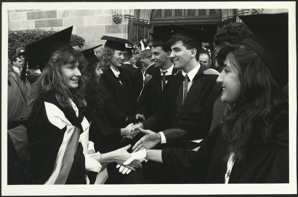 New Graduates Congratulating Each Other Outside the Great Hall