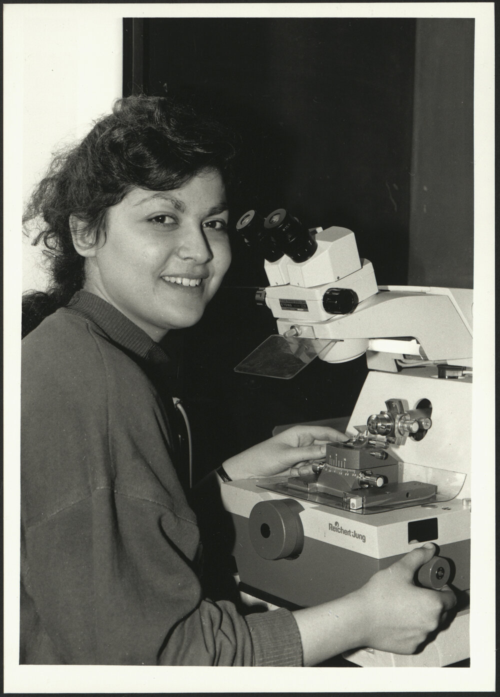 Biology - Student Using the Microtome to Slice Ultrathin (0.000005mm) Sections of Tissue for Examination
