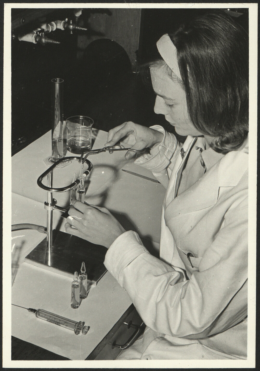 Pharmaceutical Chemistry Laboratory Female Student Preparing Ampoules
