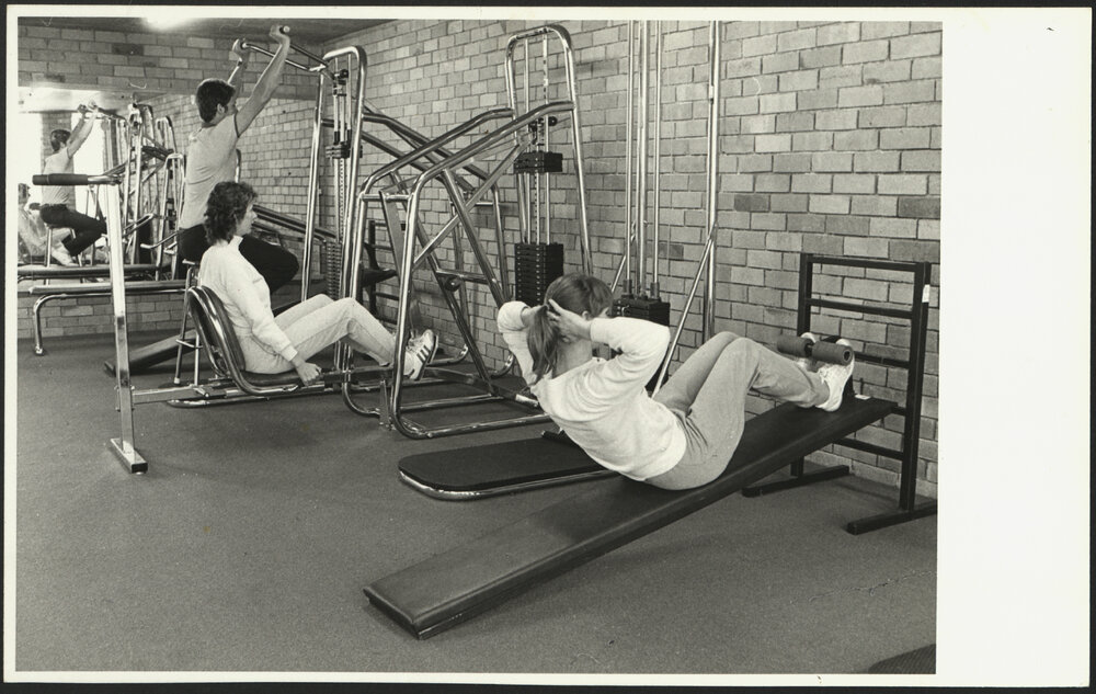 Women Trying Out Equipment in the New Sports Gymnasium