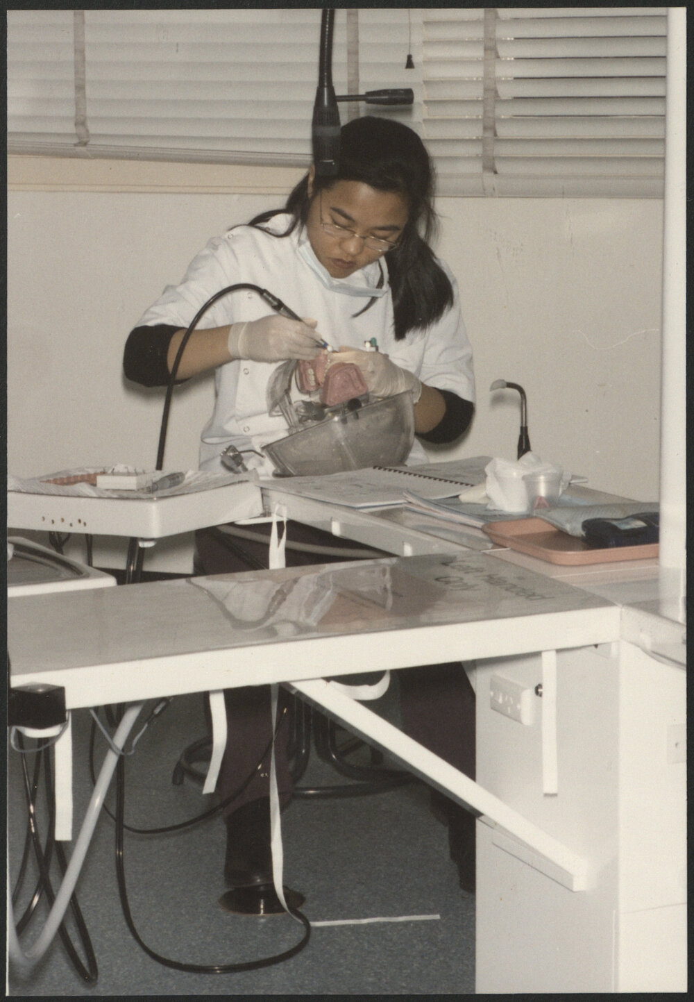 Dental Student in Laboratory Working on Dentures